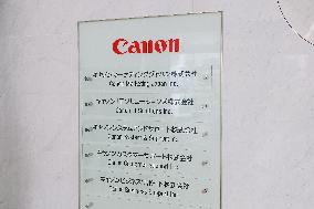 Canon Marketing Japan signboard and logo